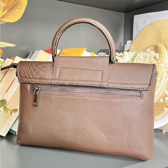 Luce vegan leather clutch